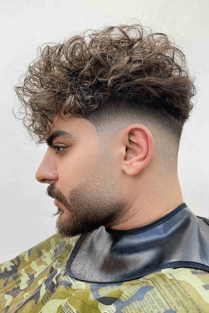 The Curly High Top Fade - round face men hairstyle