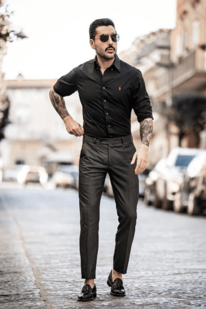 Grab your black shirt and pair it with slim-fit black trousers or chinos