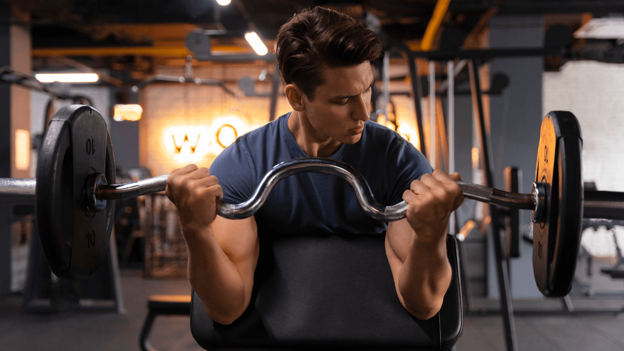 How to Preacher Curl for Peak Bicep Growth (Form Tips)